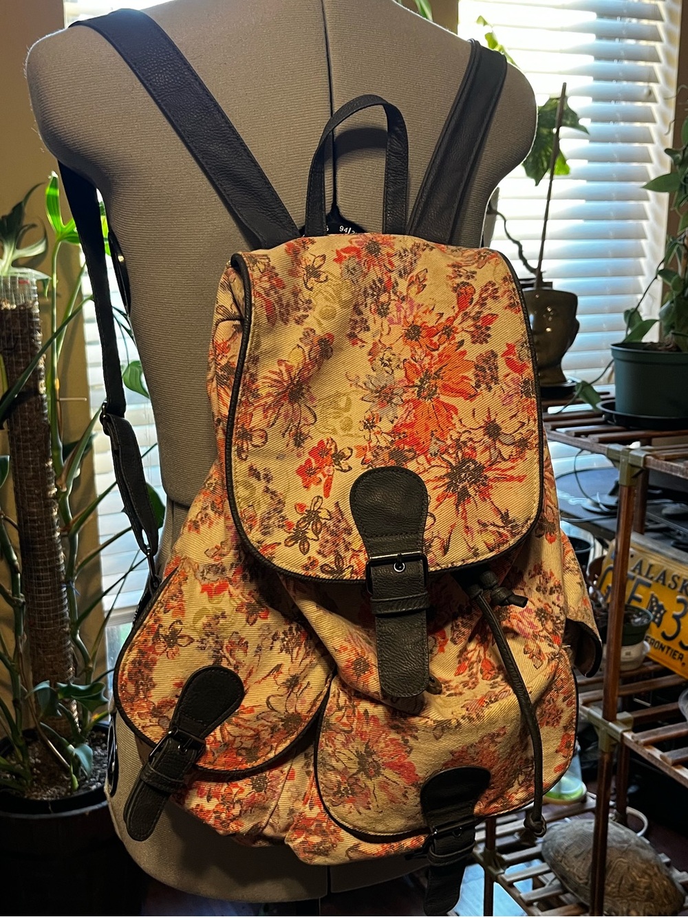 Icing Floral Canvas Backpack with Black Trim and Orange-Pink Flowers